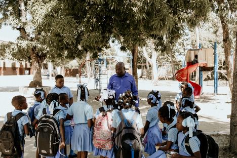 Pastor Luc with Children from Heart to Heart Haiti Children's Home